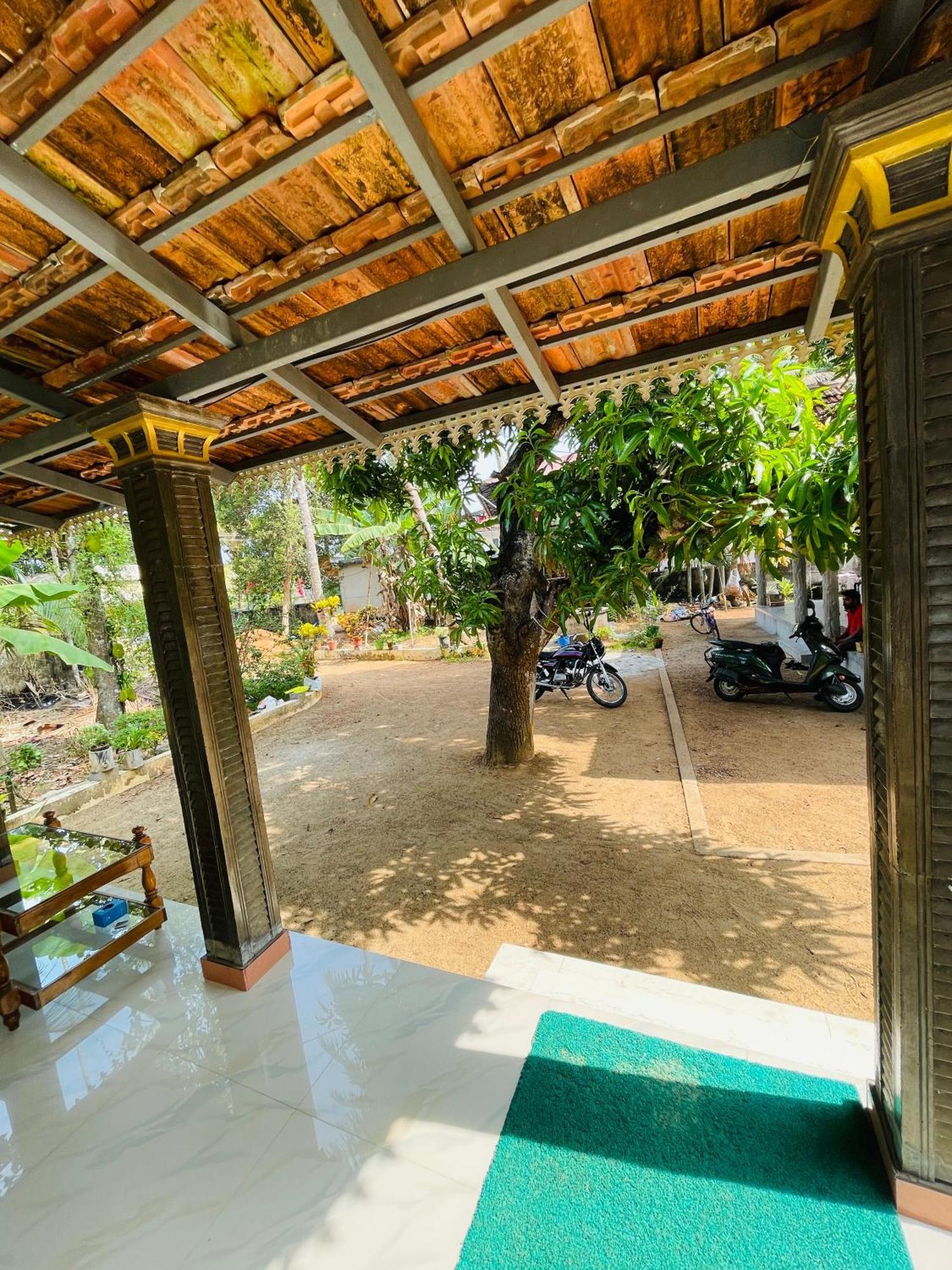 The Munroe Villagio Homey Mundrothuruth Phòng bức ảnh